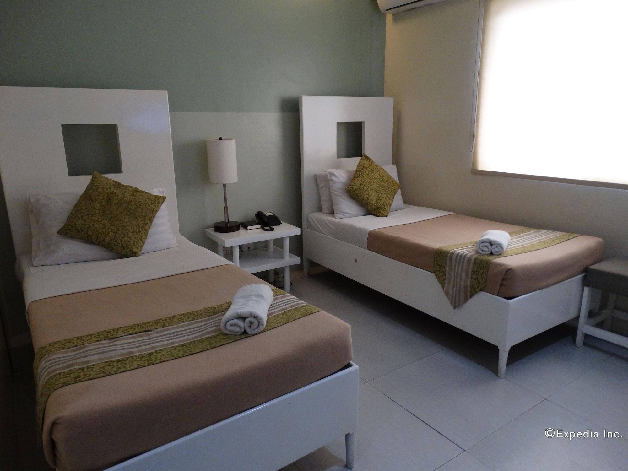 Empire Suites Hotel Puerto Princesa Екстер'єр фото