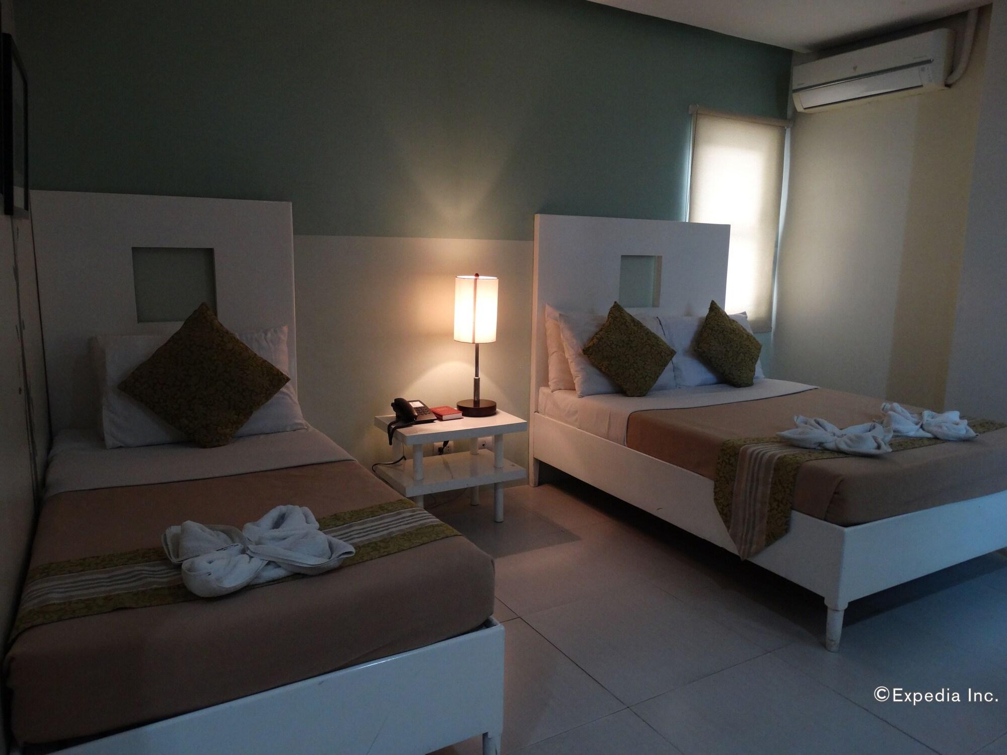Empire Suites Hotel Puerto Princesa Екстер'єр фото