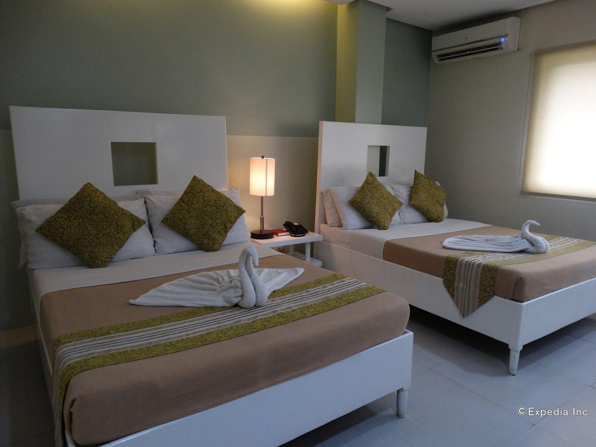 Empire Suites Hotel Puerto Princesa Екстер'єр фото