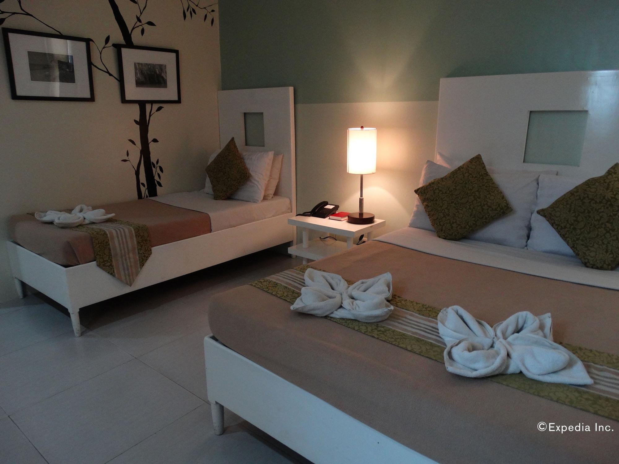 Empire Suites Hotel Puerto Princesa Екстер'єр фото