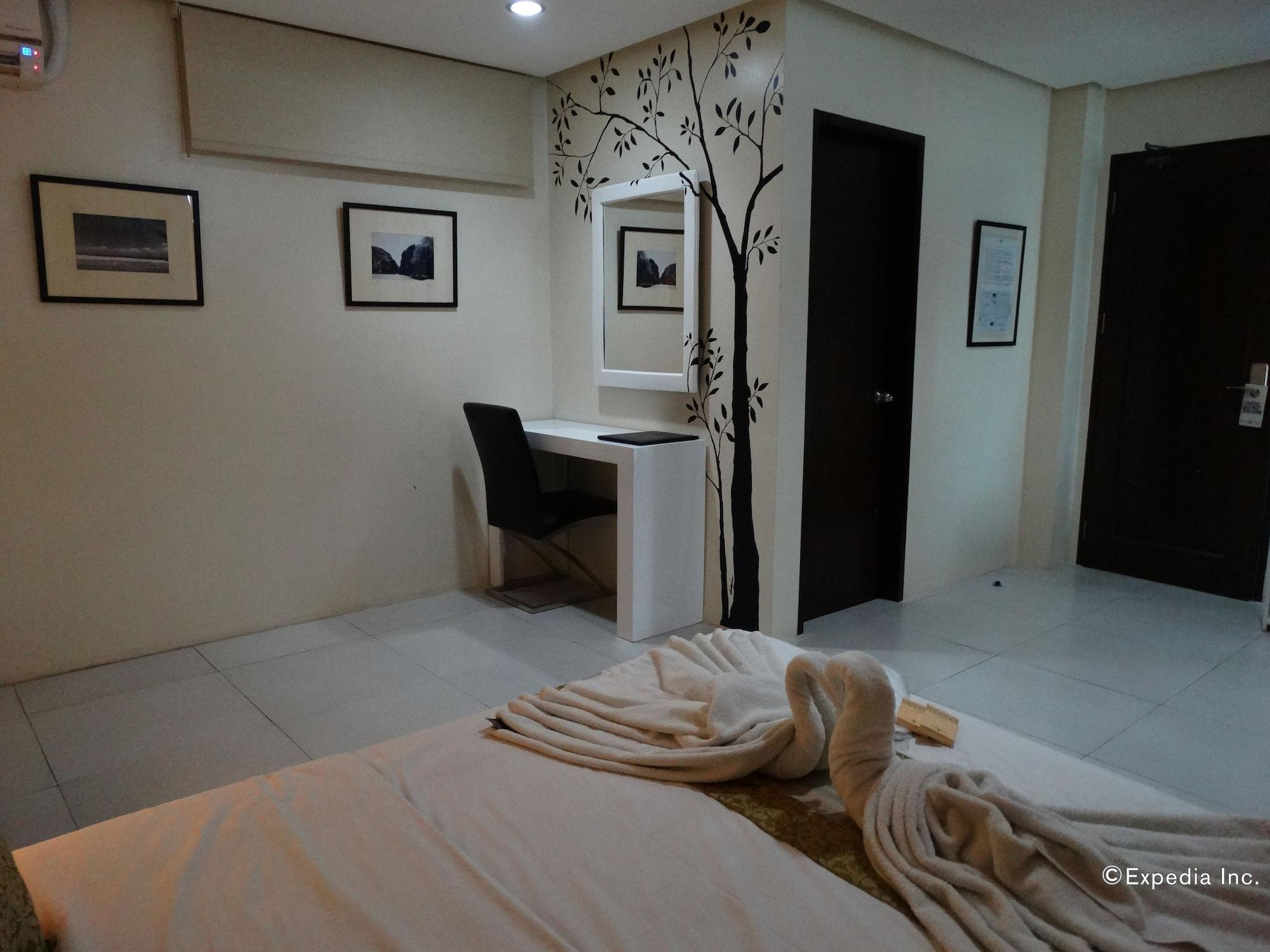 Empire Suites Hotel Puerto Princesa Екстер'єр фото