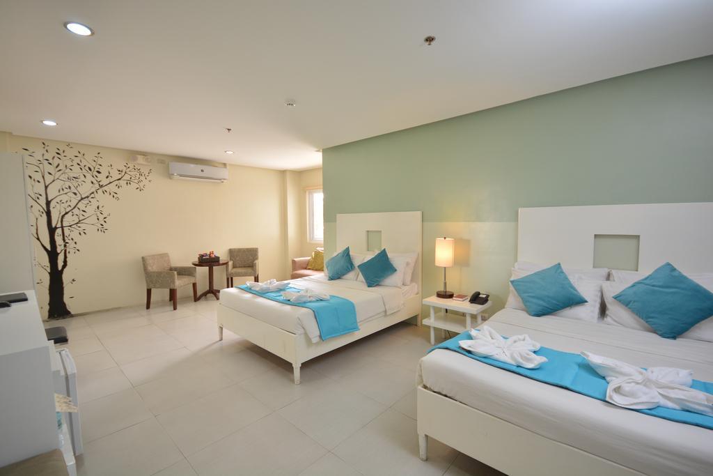Empire Suites Hotel Puerto Princesa Екстер'єр фото