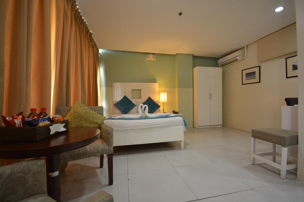 Empire Suites Hotel Puerto Princesa Екстер'єр фото