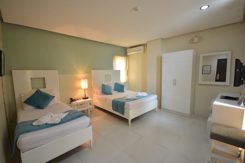 Empire Suites Hotel Puerto Princesa Екстер'єр фото