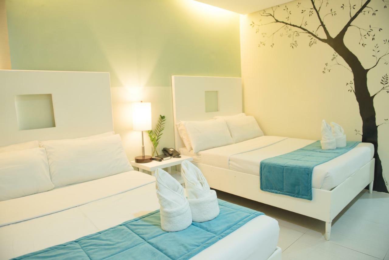 Empire Suites Hotel Puerto Princesa Екстер'єр фото